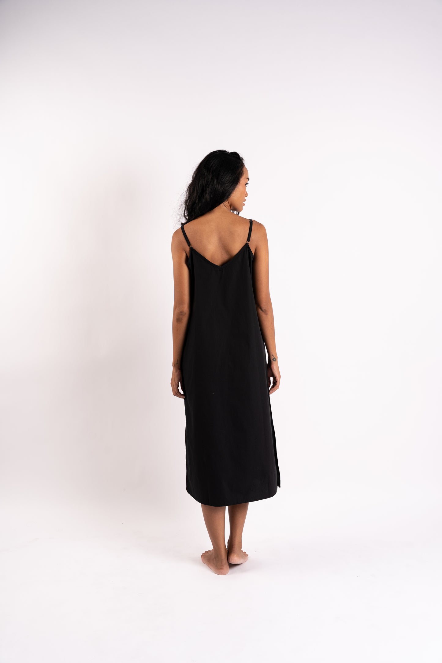 Black cotton poplin slip dress | back view